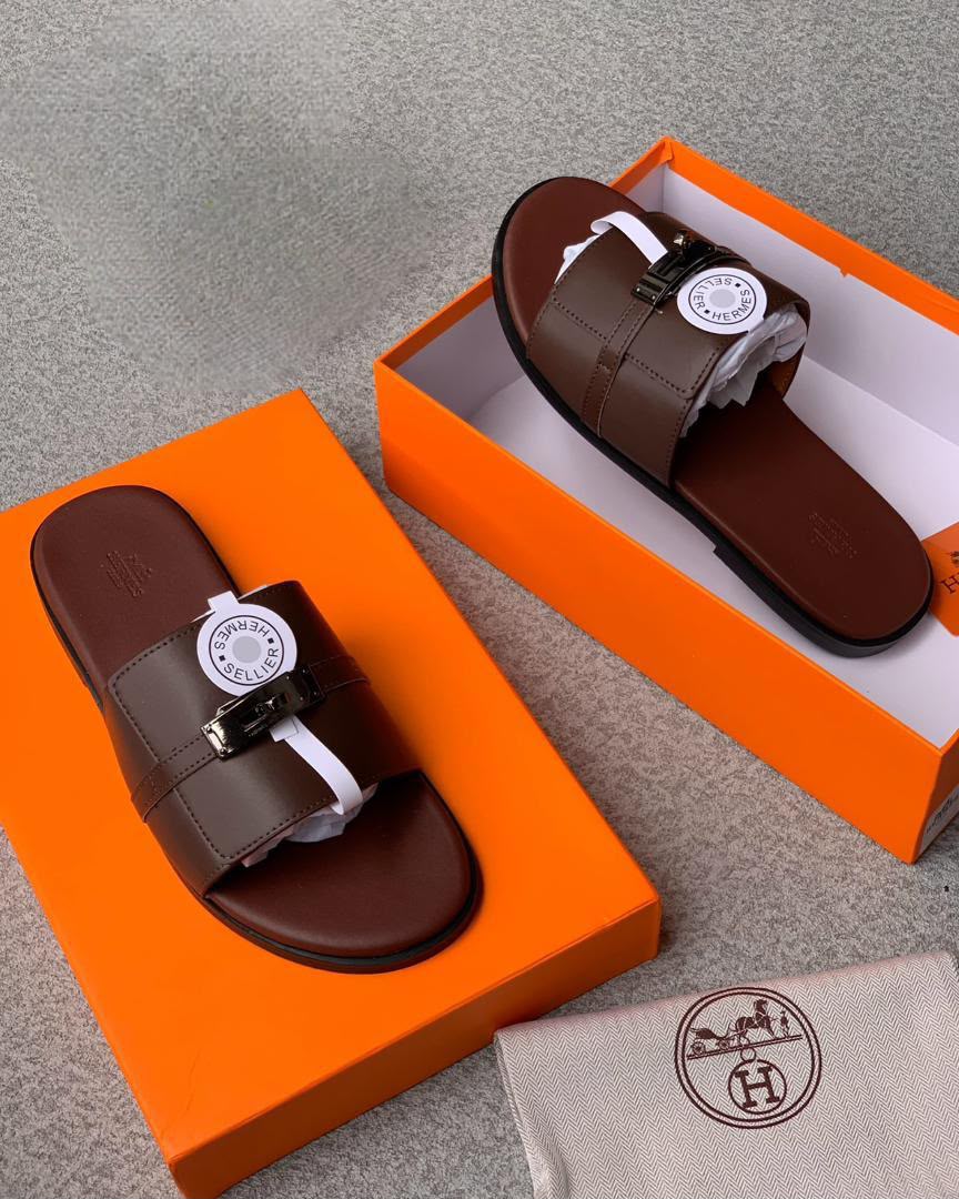 Hermès “Gabriel” Brown Leather Slide Sandals with Metal Buckle